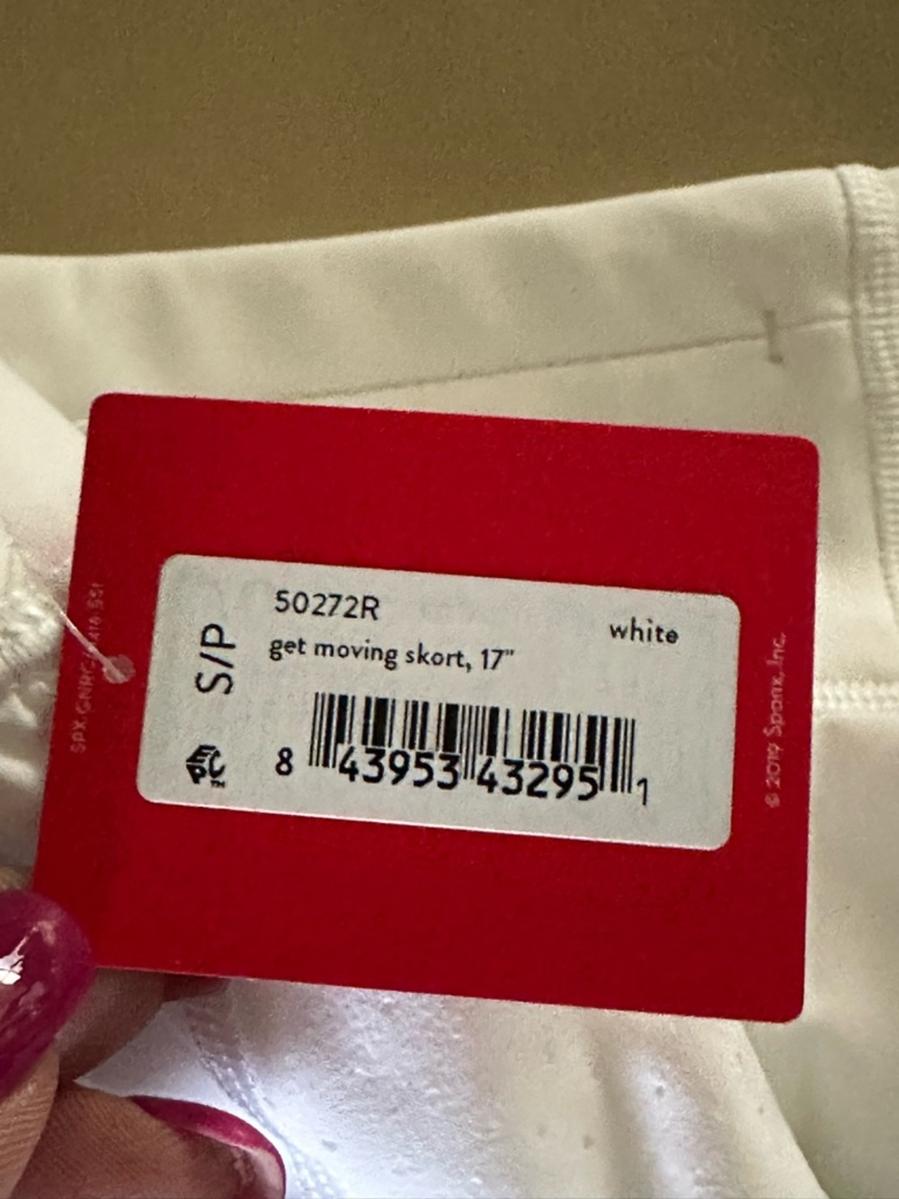 SPANX "Get Moving" Skort in white. - Picture 9 of 9